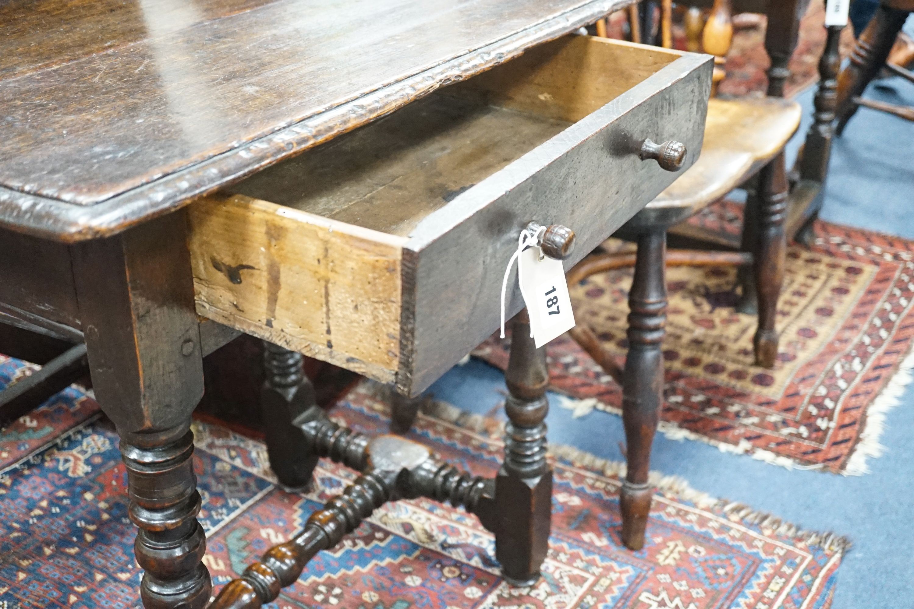 A William and Mary rectangular oak side table on turned legs with H stretcher, width 65cm, depth 50cm, height 69cm